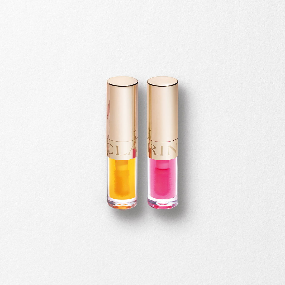 Clarins 迷你凝亮護唇油雙支裝 1.4ml*2